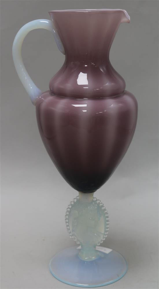 A Murano glass opalescent and mauve coloured ewer